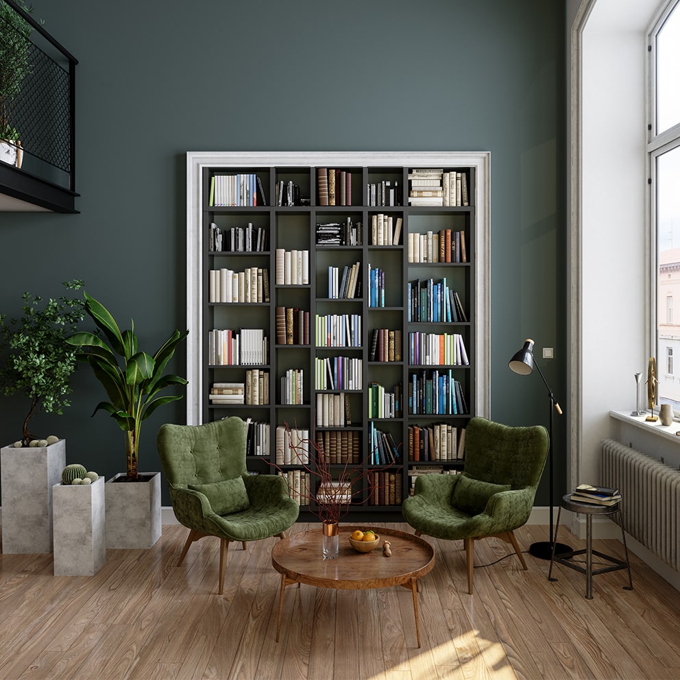 Built-in bookcase full of books in luxury paisley green room with balcony & large window